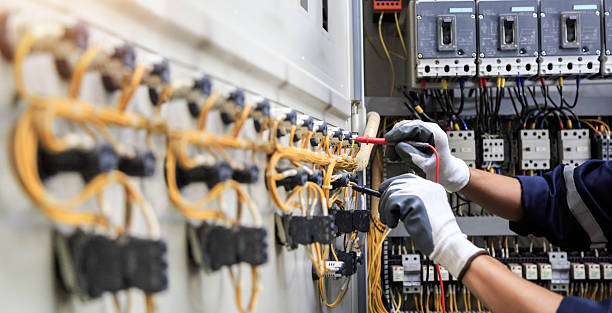 Professional Electrician technician working in Riviera Beach, FL